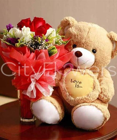 A LOVING TEDDY WITH BLOOMS flowers CityFlowersIndia 