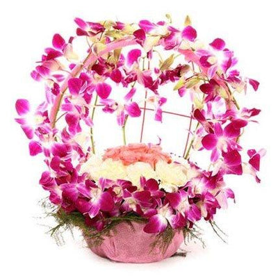 Heart Holding Orchids Basket flowers CityFlowersIndia 